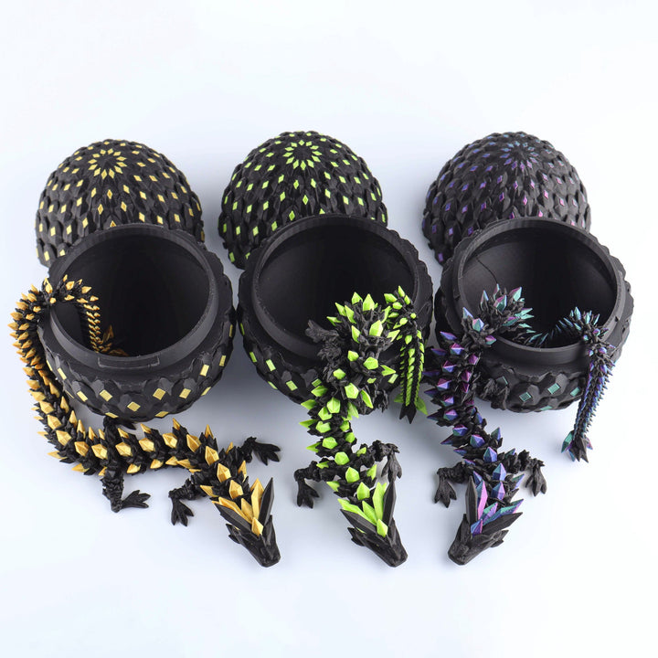 Dark crystal dragon fidget toy set with black shell and green, purple articulated pieces