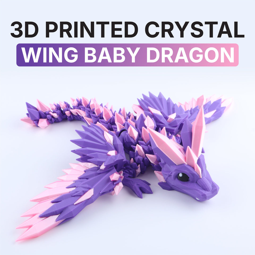 Purple crystal-wing baby dragon desk toy with pointed faceted wings and black eye
