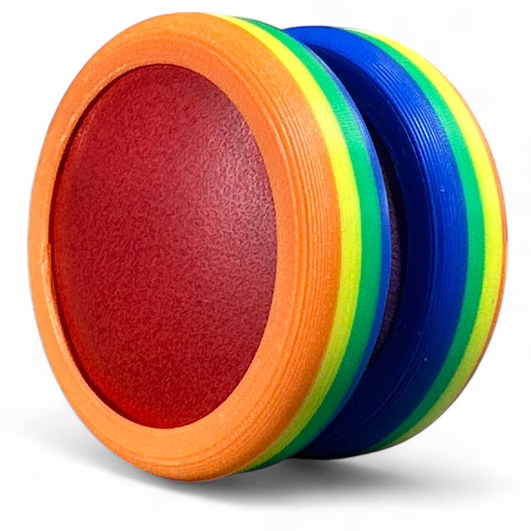 Rainbow pride ring with orange and blue stripes and red inner oval.