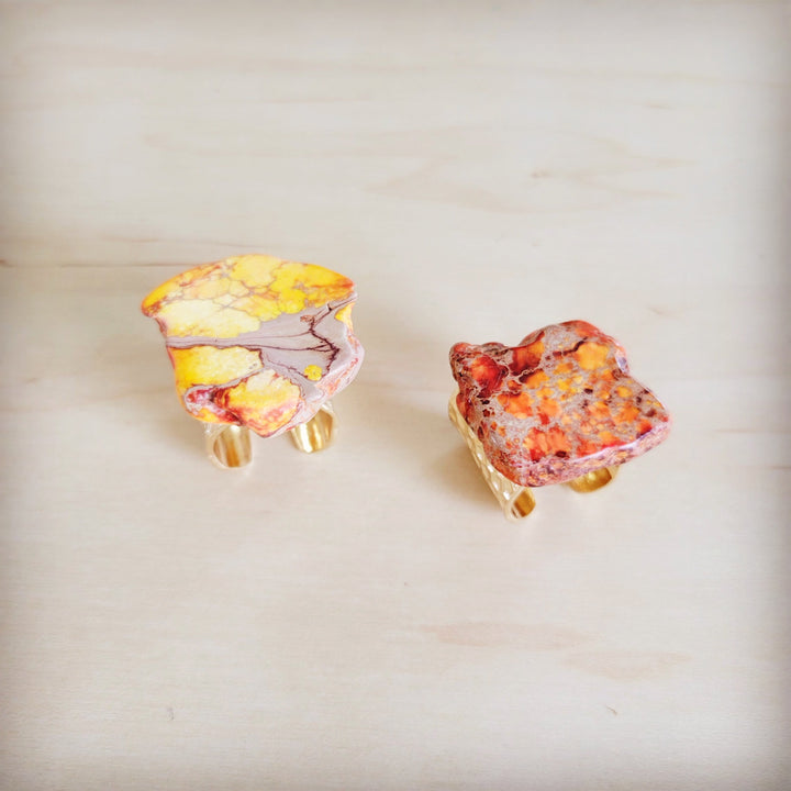 Orange and red marbled resin statement ring with gold-tone open band