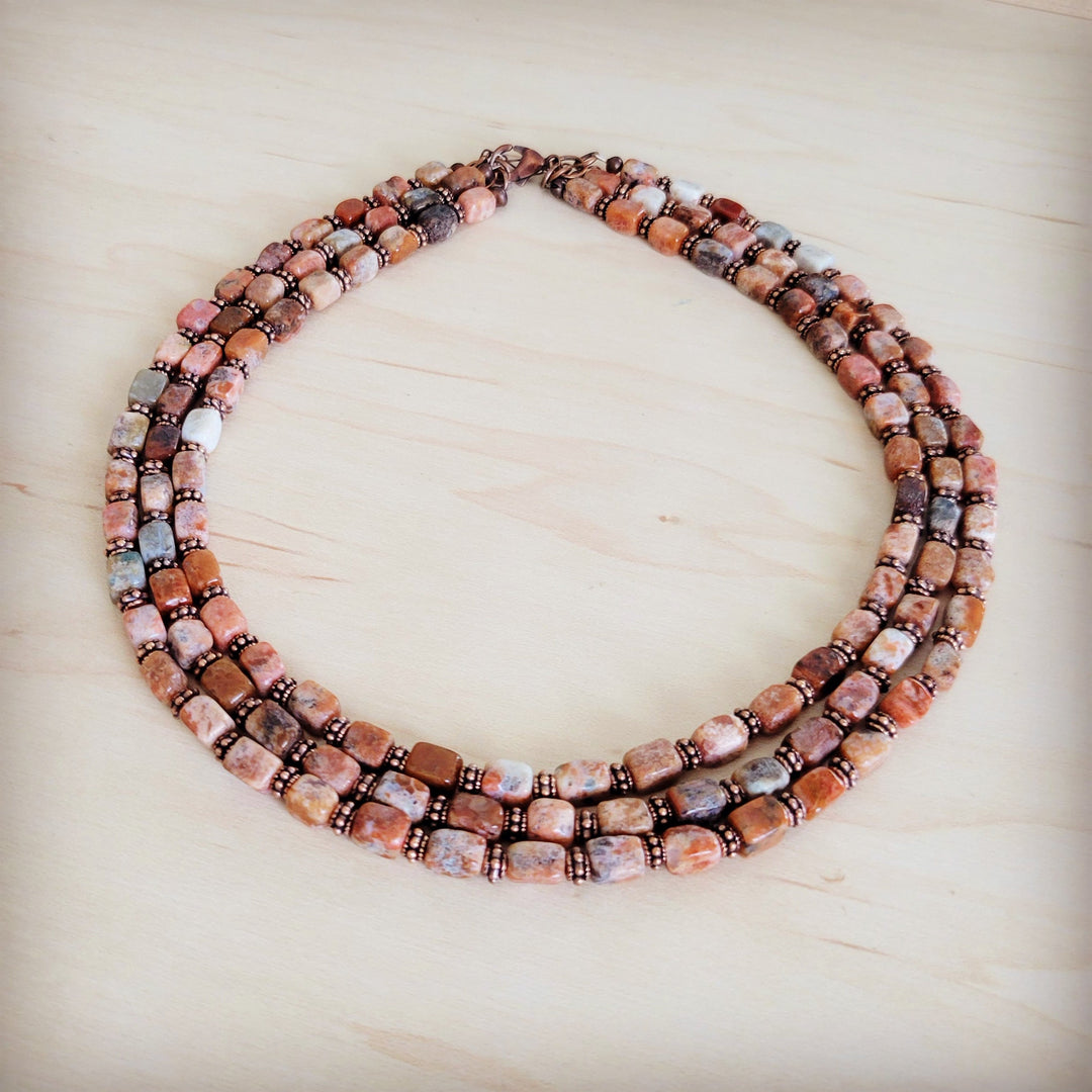 Triple-strand beaded collar necklace with copper-brown bead squares and small cube accents