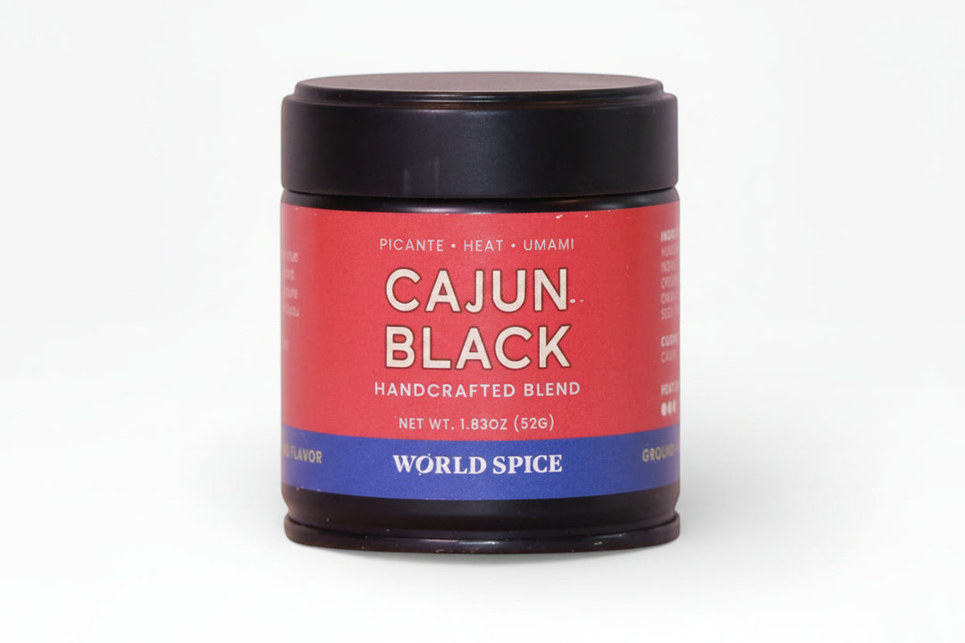 Cajun spice blend jar with black lid and red label, handcrafted blend text