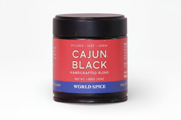 Cajun spice blend jar with black lid and red label, handcrafted blend text