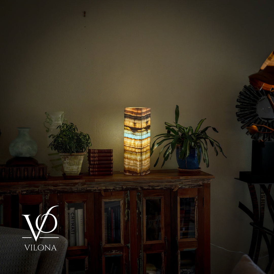 Small square table lamp with striped onyx-style shade in gold, cream, and blue-green tones