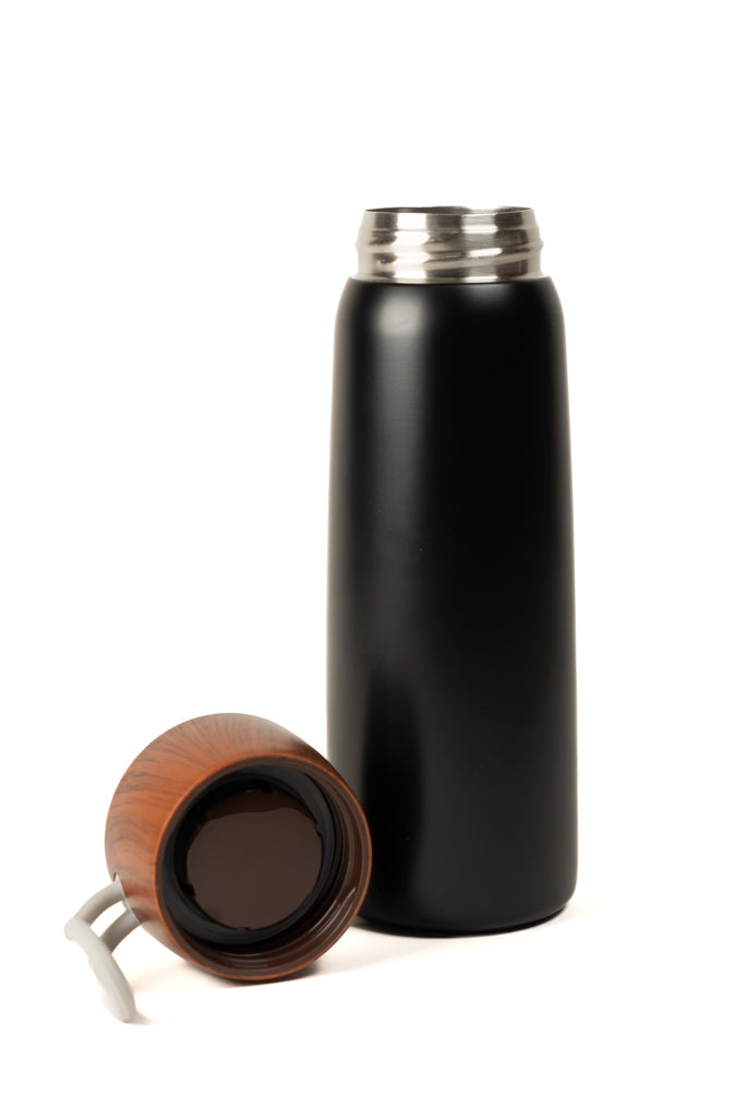 Black insulated tumbler with wooden lid partly removed, showing inner rim