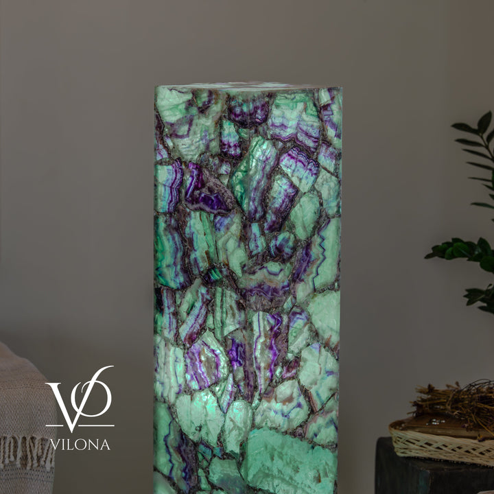 Fluorite floor lamp column, teal and purple mineral texture with bright glow
