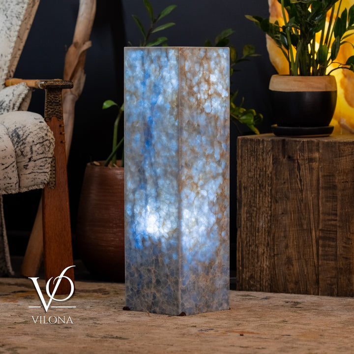 Small square blue stone floor lamp, glowing panel-style light on top and sides