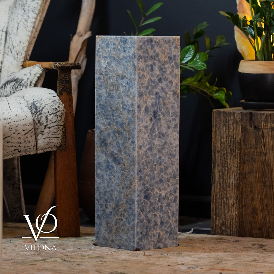 Small square blue stone floor lamp, tall pillar shape with softly glowing sides