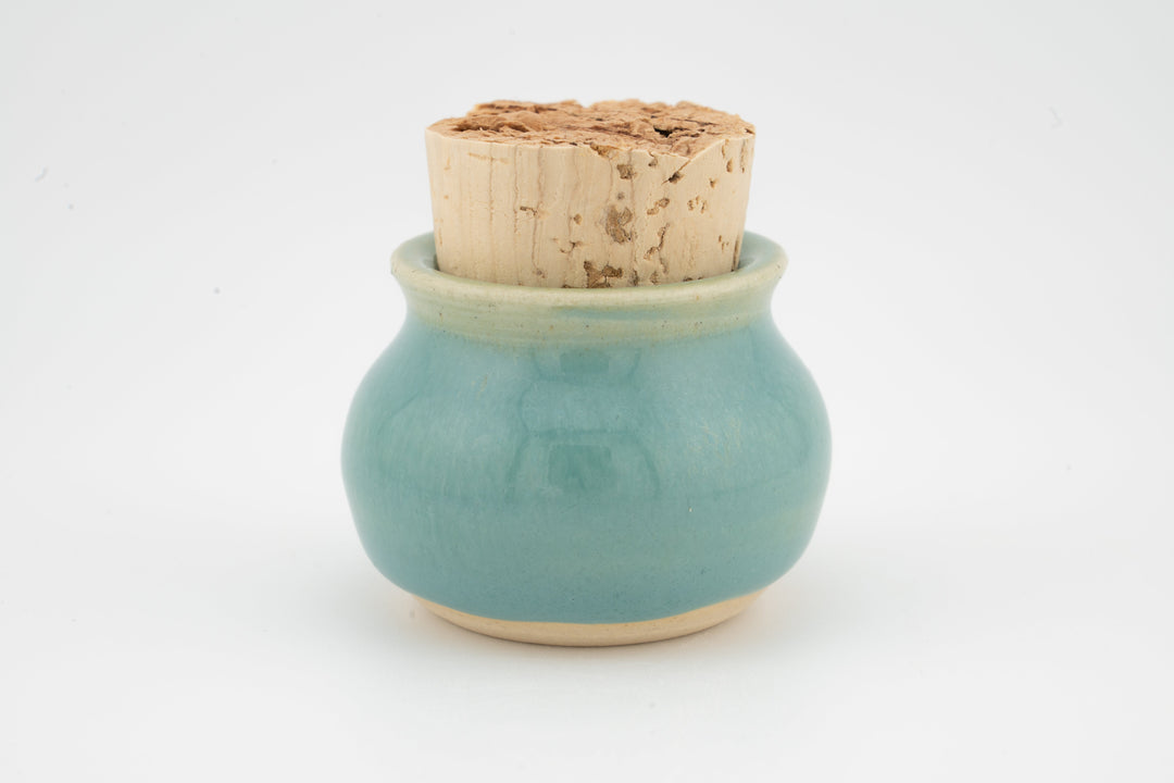 Mini corked jar with teal glazed body and cork stopper