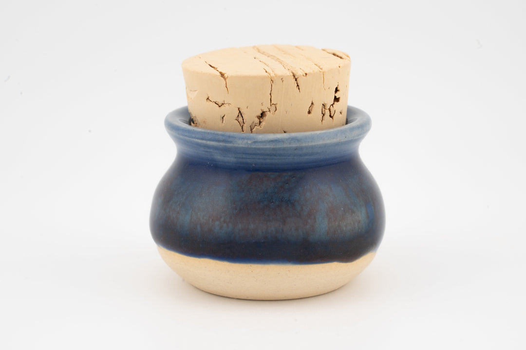 Mini corked jar with dark blue glazed body and cork stopper