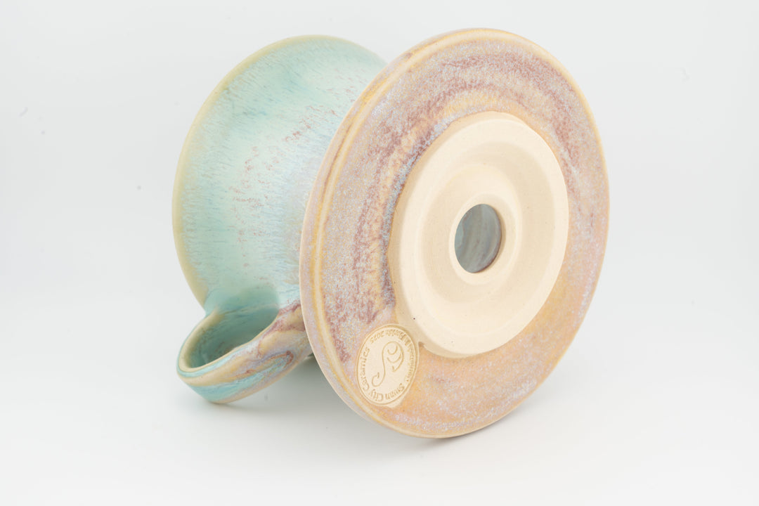 Ceramic coffee pour-over dripper base, teal and blush speckled glaze with outlet view