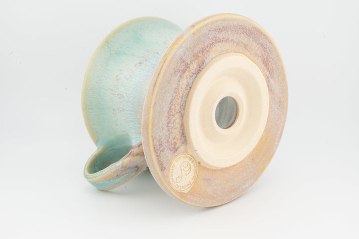 Ceramic coffee pour-over dripper base, teal and blush speckled glaze with outlet view