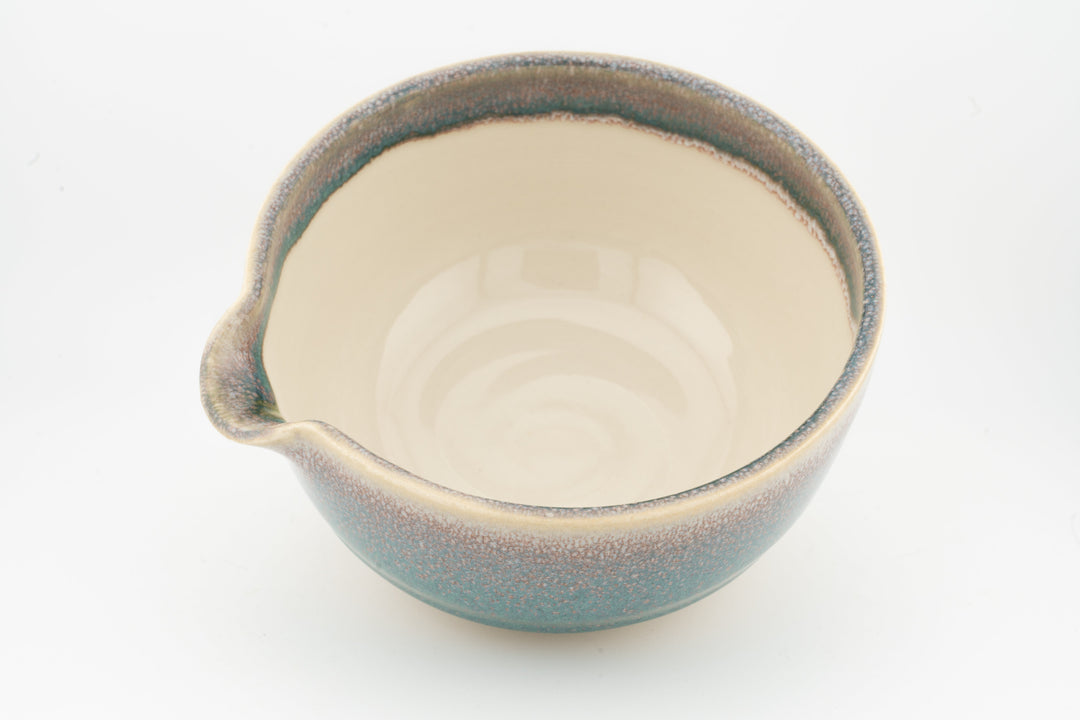 Ceramic bowl with optional spout, speckled blue-green rim and cream interior