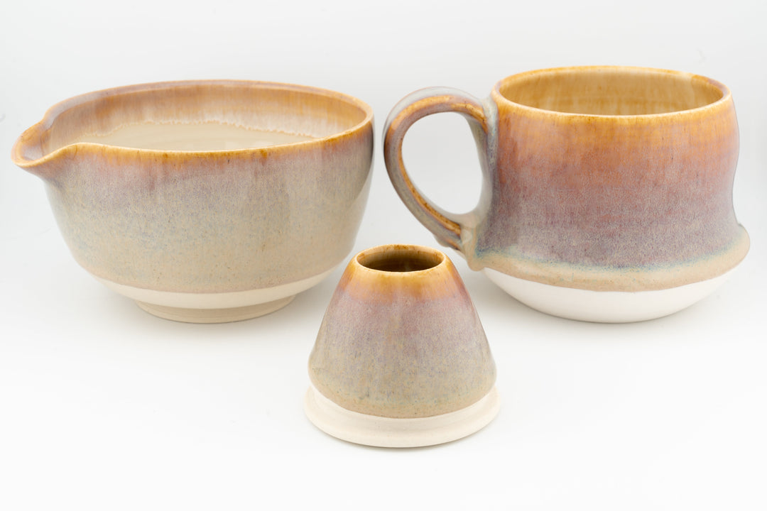 Ceramic matcha bowl (chawan) set with curvy cups and small spouted pitcher