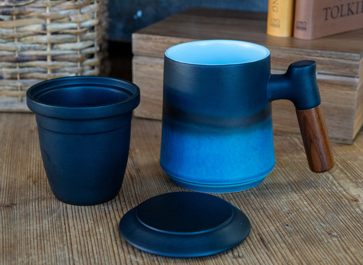 Blue ceramic tea steeping mug with matching lid and small cup