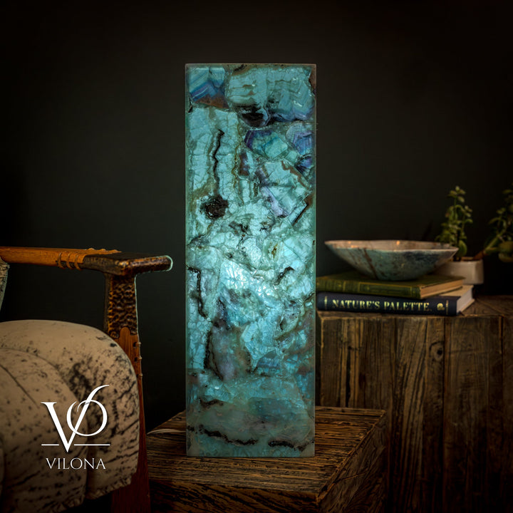 Fluorite crystal table lamp, tall square teal-blue prism with visible natural fissures