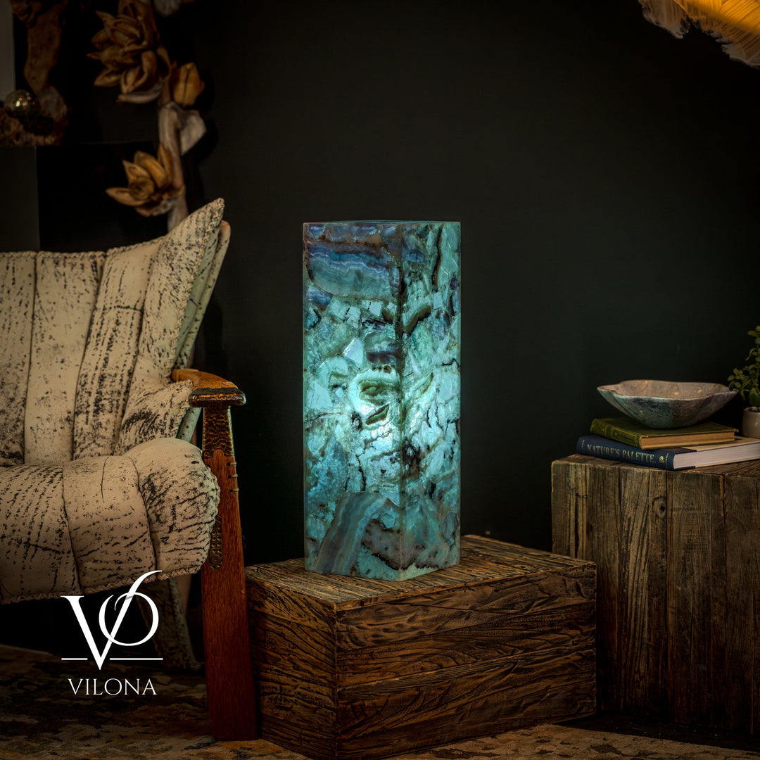 Fluorite crystal table lamp, upright square teal-blue crystal body with swirling patterns