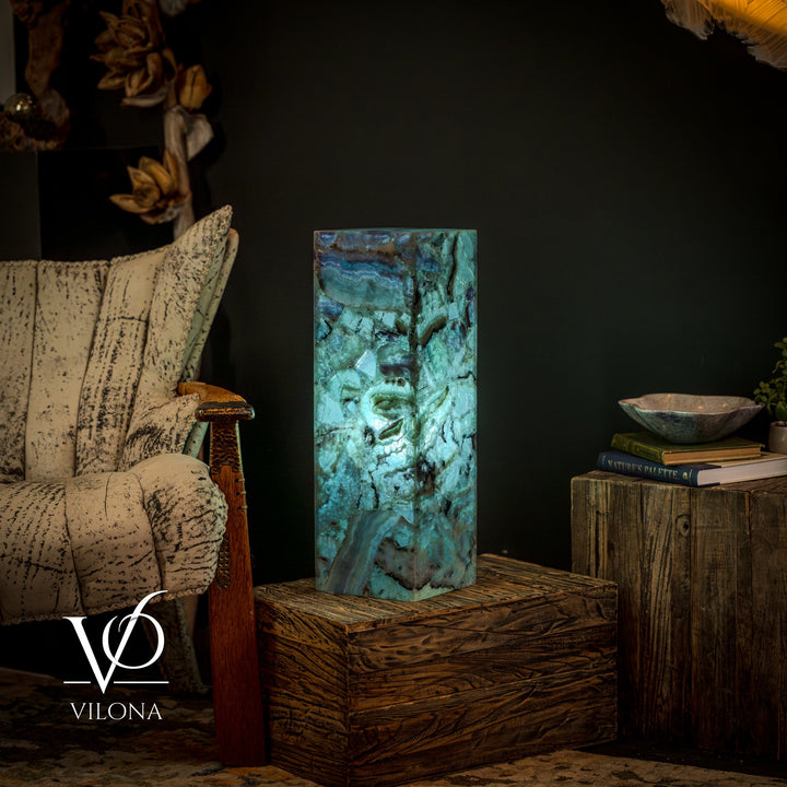 Fluorite crystal table lamp, upright square teal-blue crystal body with swirling patterns
