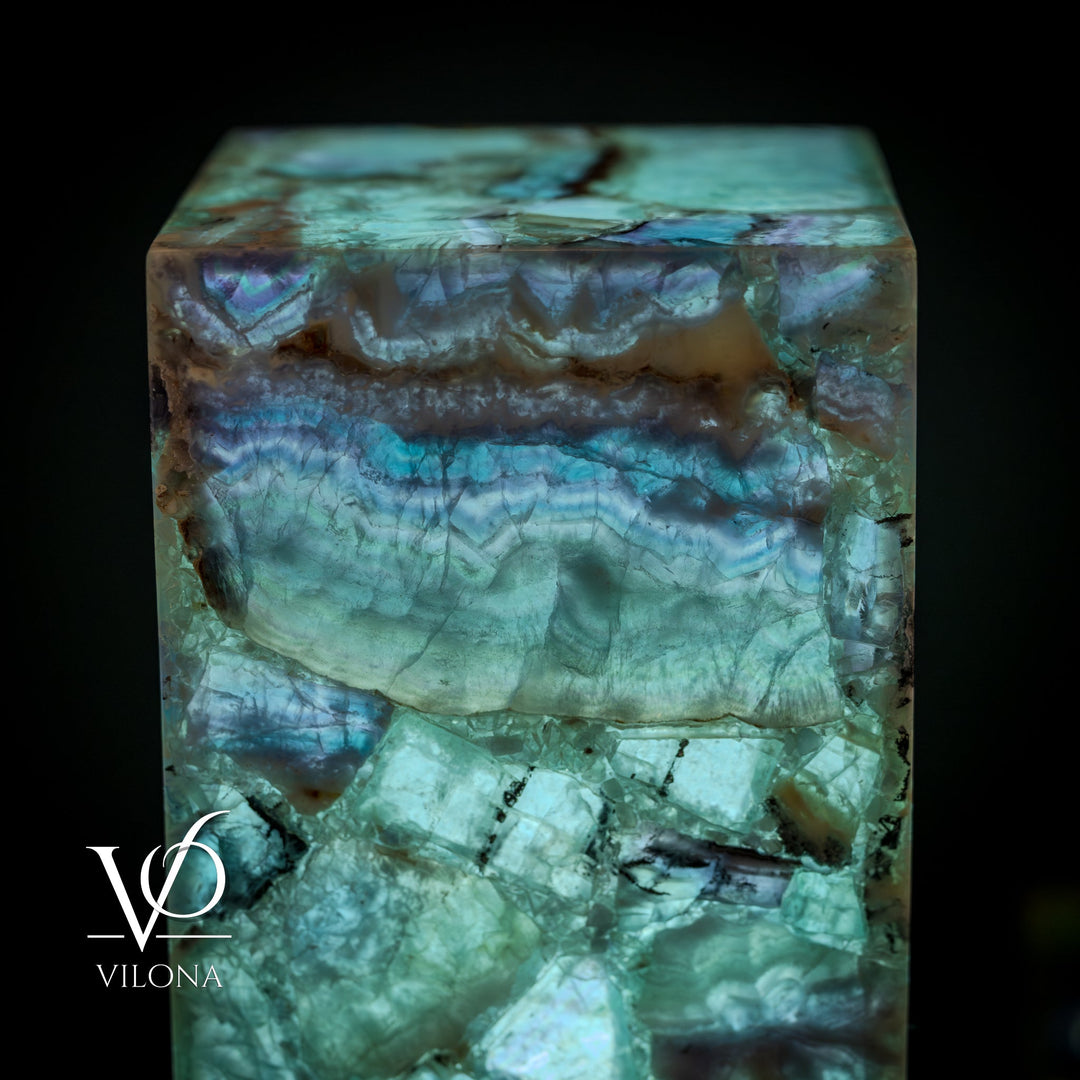 Fluorite crystal table lamp close-up of glowing square top and teal-blue stone layers