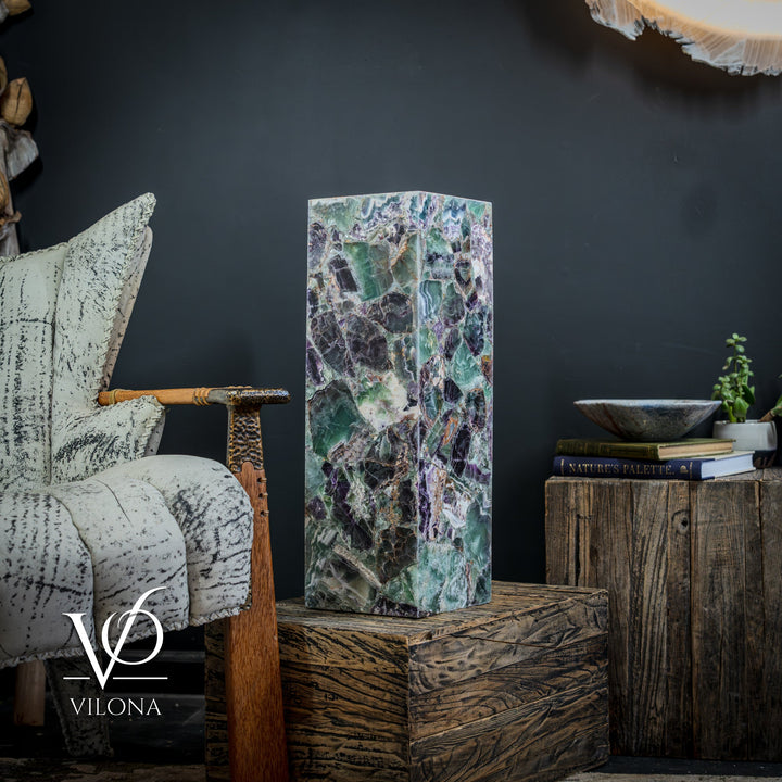 Fluorite crystal table lamp on wooden crate, square crystal block with teal and mauve swirls