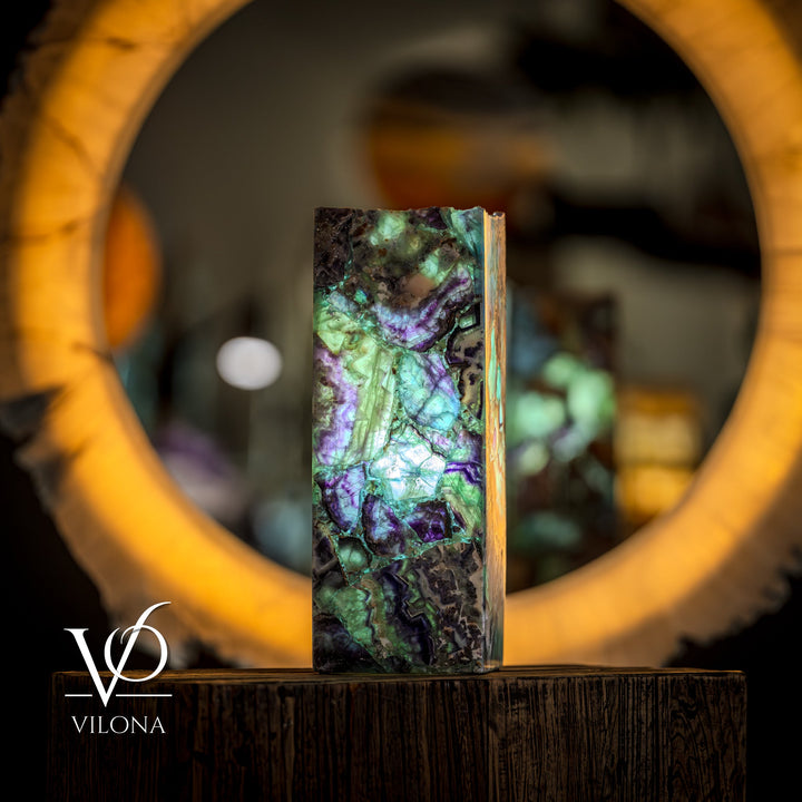 Fluorite table lamp, narrow side profile of square live-edge fluorite with teal glow