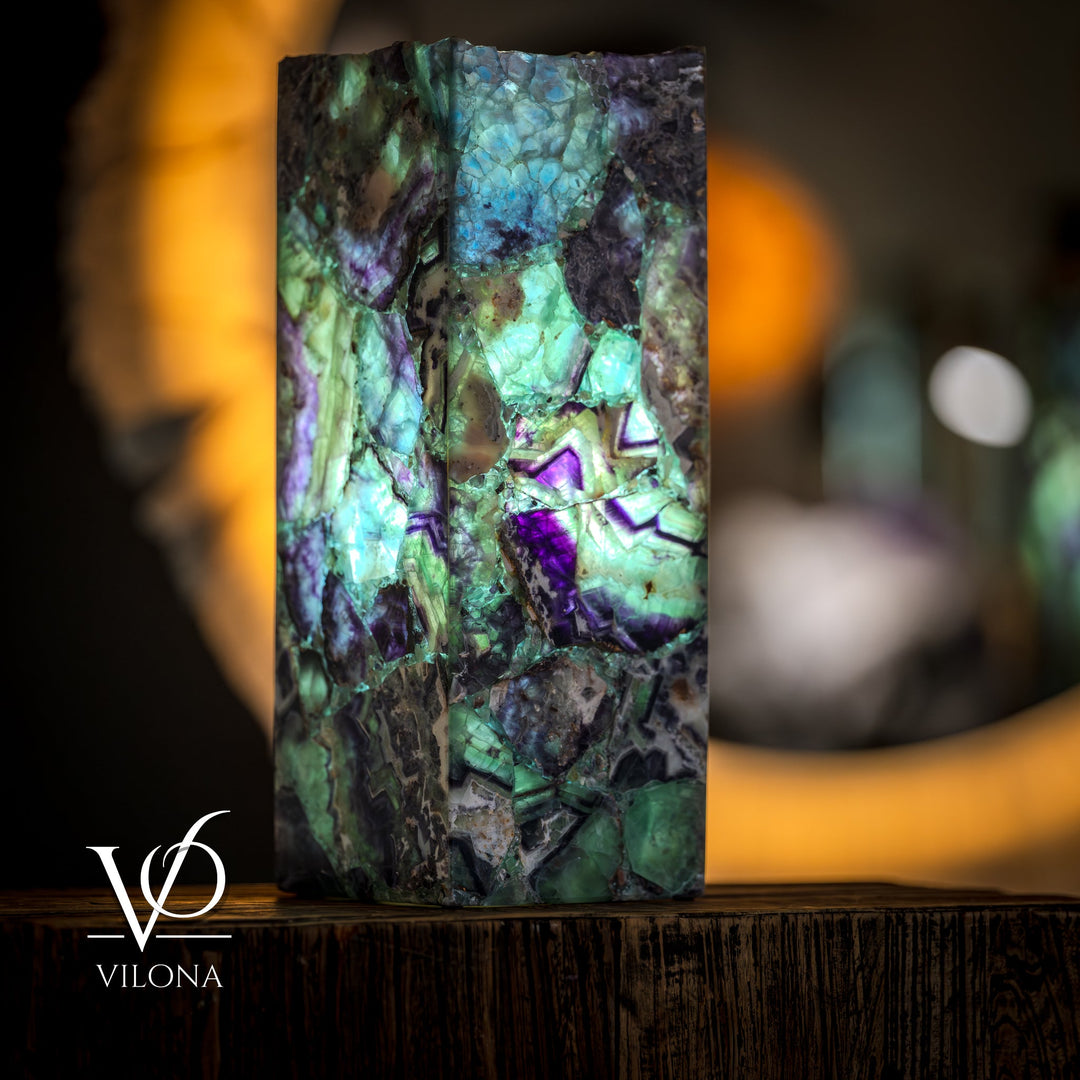 Fluorite table lamp, square fluorite panel with green-blue glow and violet stone marks