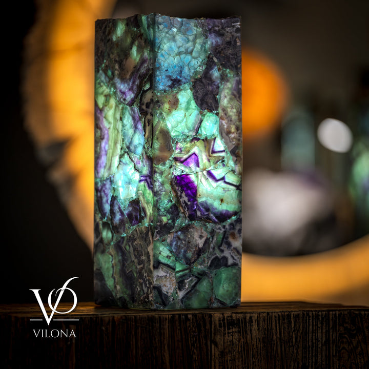 Fluorite table lamp, square fluorite panel with green-blue glow and violet stone marks