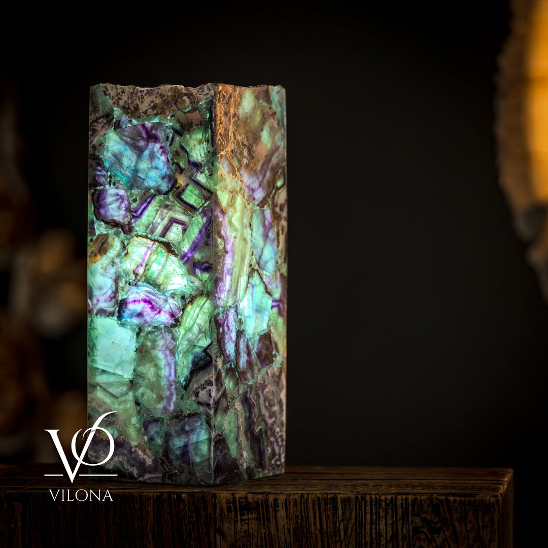 Fluorite table lamp, square live-edge fluorite face with teal-green light and violet cracks