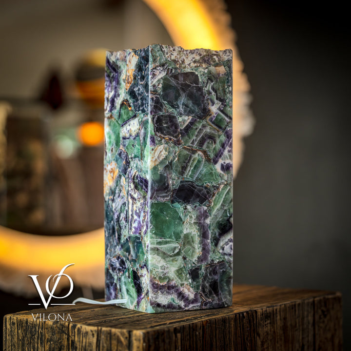 Fluorite table lamp with tall square live-edge stone body in green and purple
