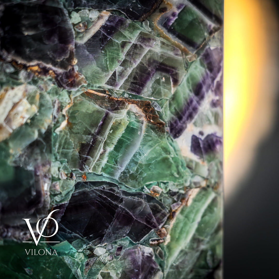 Fluorite table lamp, close-up of glowing fluorite facets in green, blue, and violet