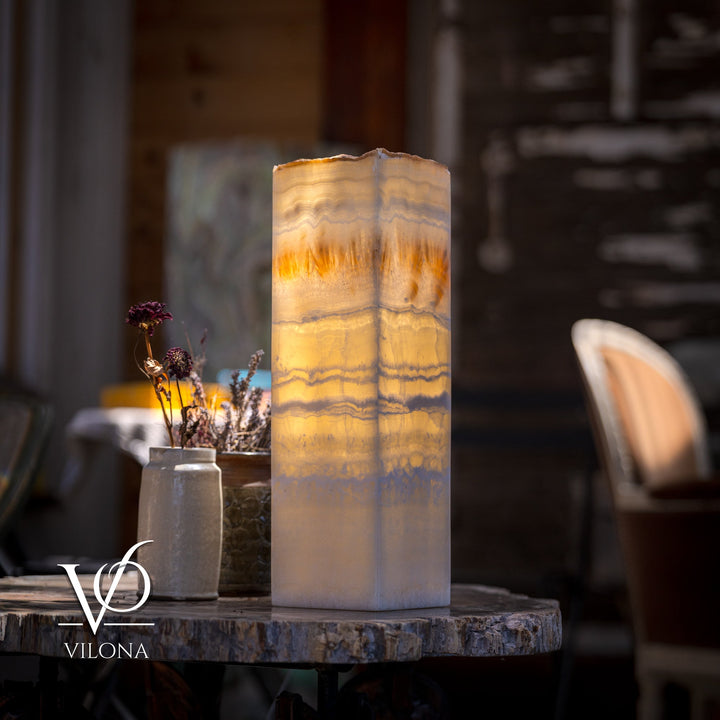Cream square onyx-style lamp shade with amber streaks, glowing from inside