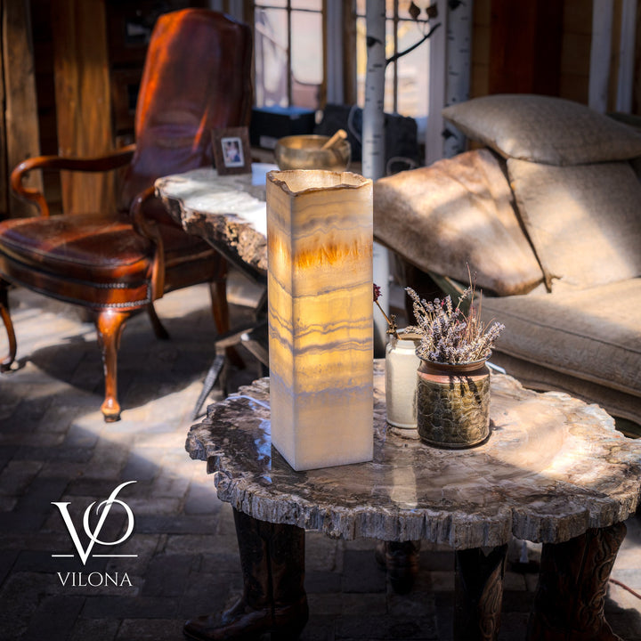 Onyx-style square table lamp with cream-and-amber veined shade glowing warmly