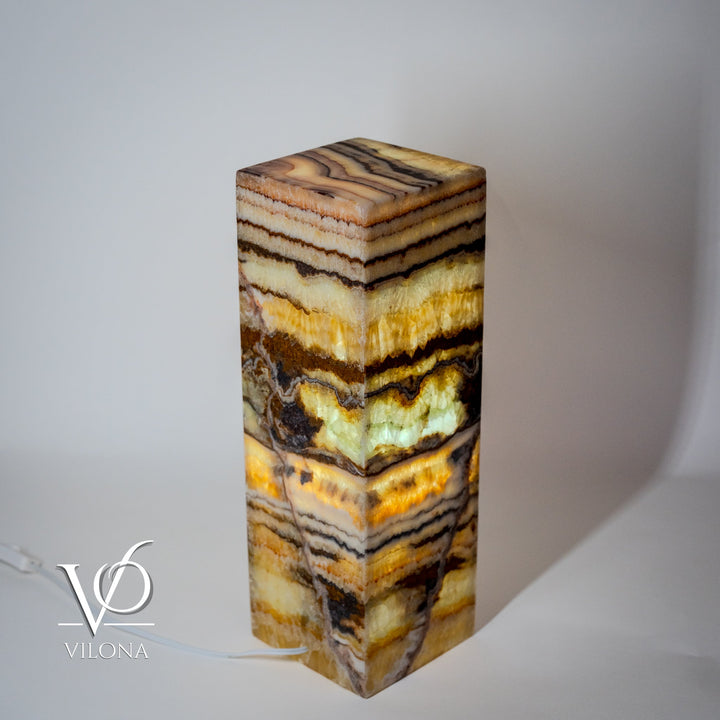 Onyx-style square table lamp with stacked stripe stone finish on square column, flat top