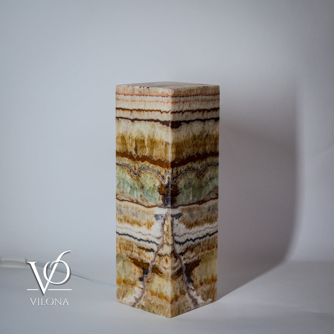 Onyx-style square table lamp with multicolor banded stone column base and flat top