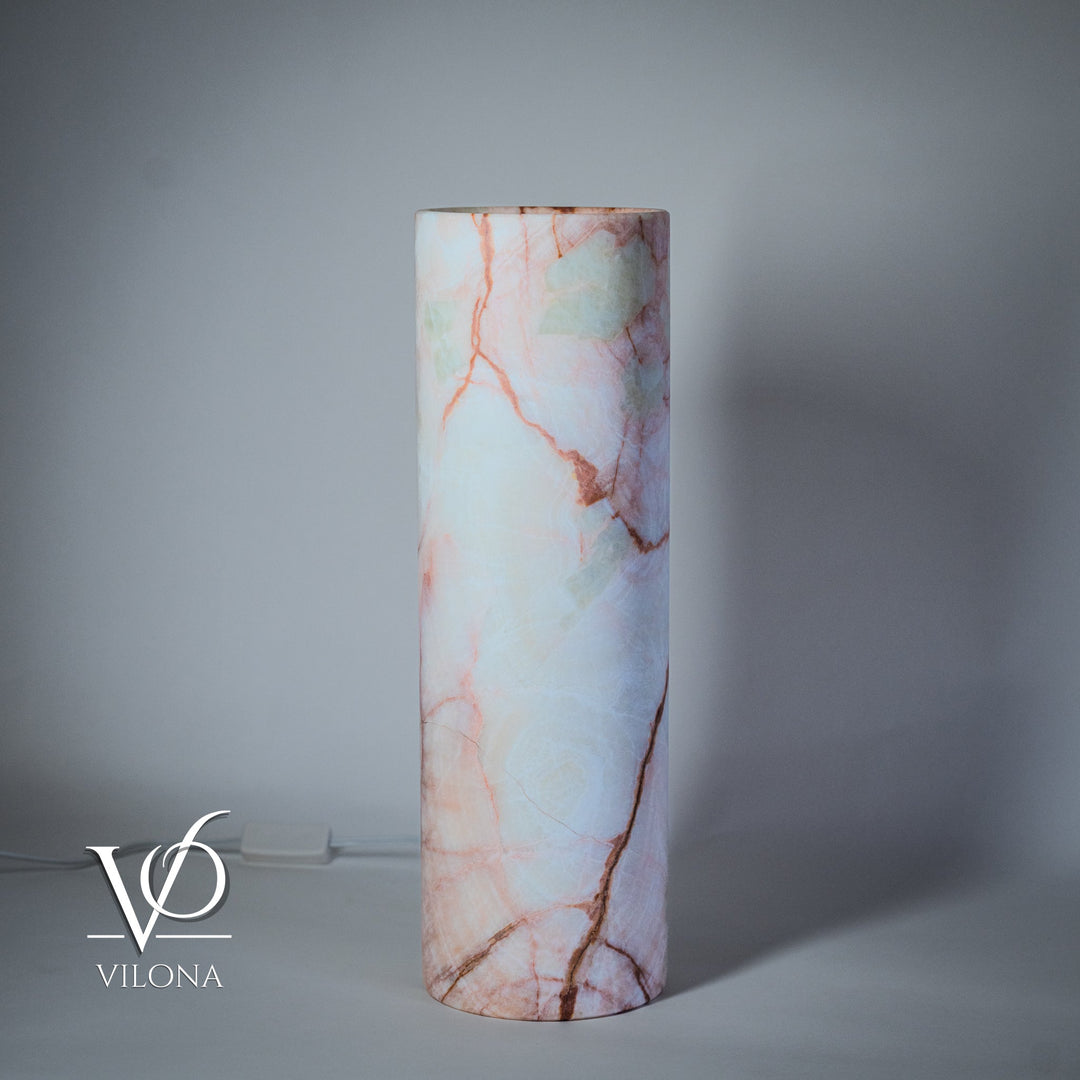 Cylindrical light-blue onyx-pattern table lamp with delicate red veining