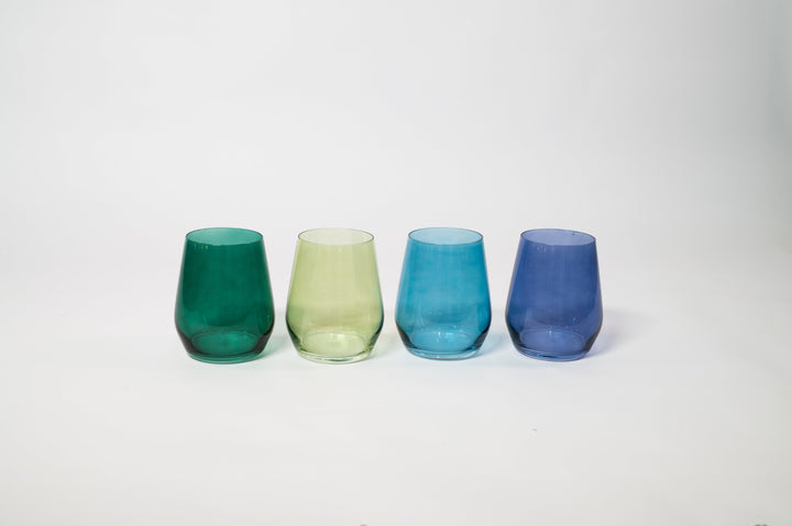 Set of 4 stemmed colored wine glasses: teal, pale green, blue, navy.
