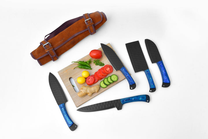 5-piece knife set with blue handles, brown leather roll, and veggie cutting board