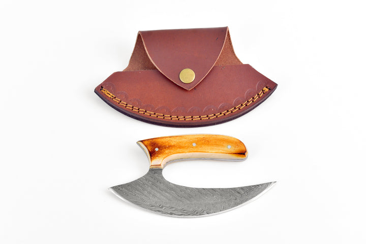 Leather knife sheath with brass snap and visible curved gray blade