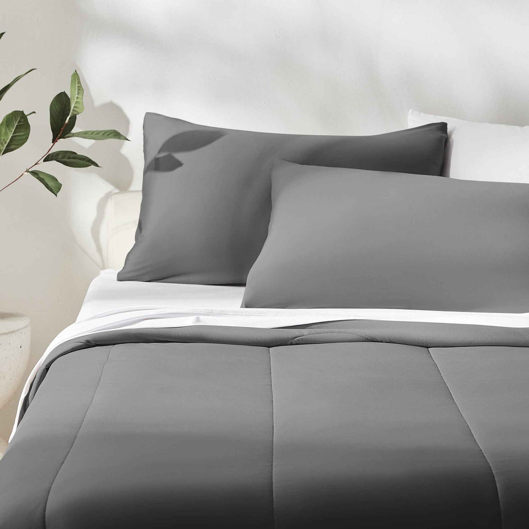 Gray cooling comforter set with neatly stitched panel design