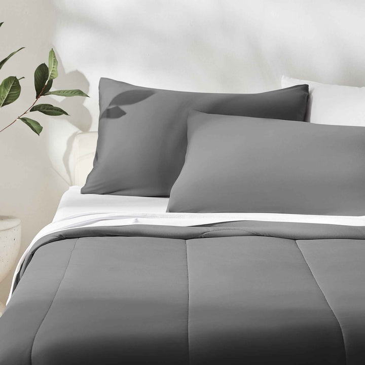 Gray cooling comforter set with neatly stitched panel design