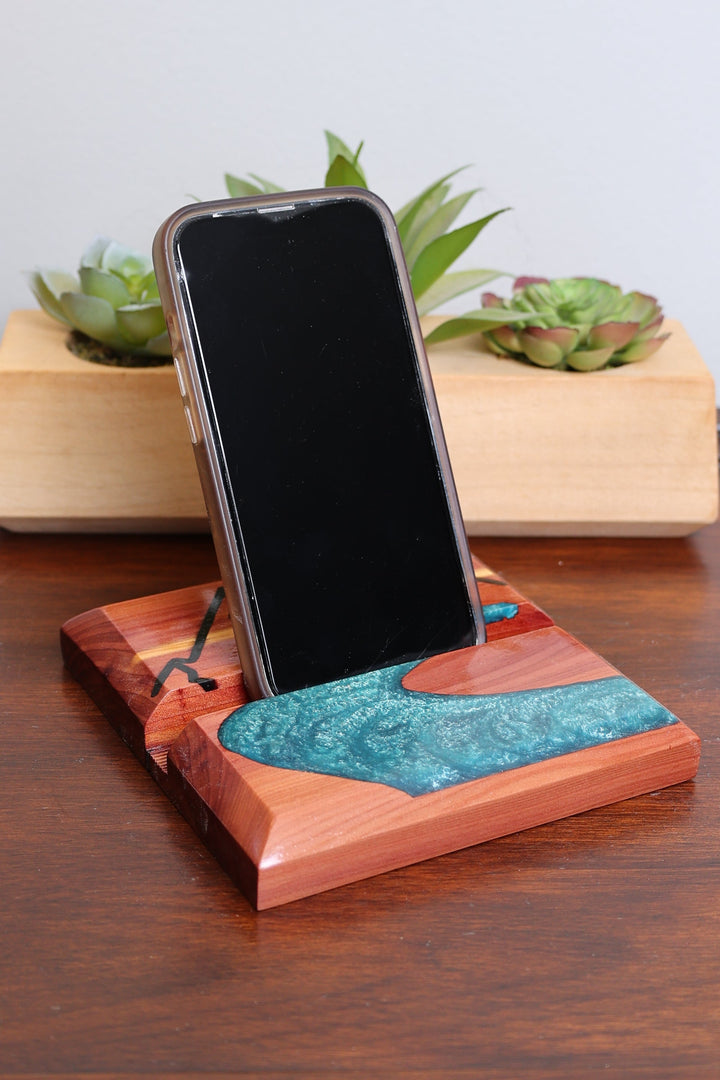 Wood and resin phone device holder with blue river inlay cradle