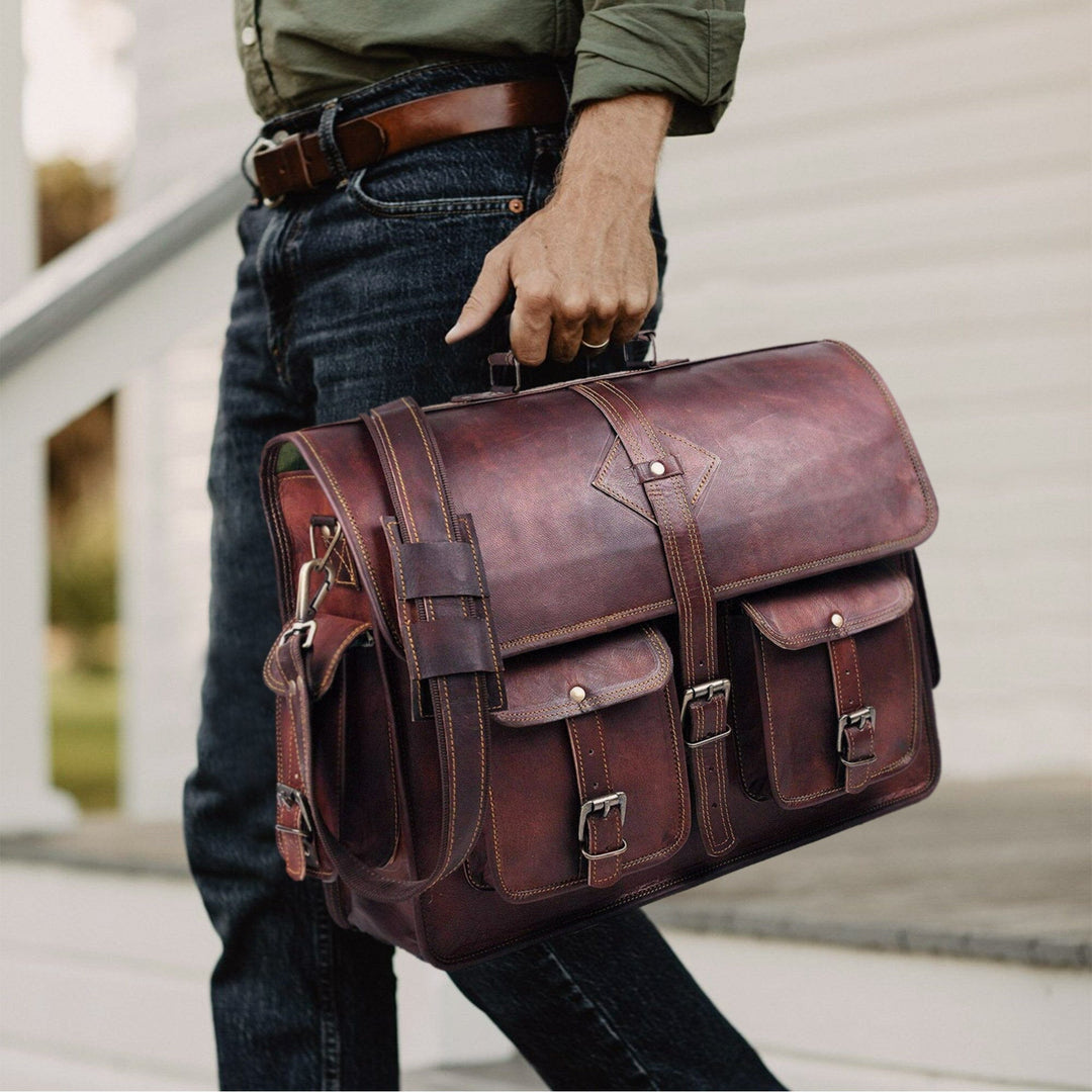 Brown leather messenger briefcase with front pockets and shoulder carry straps