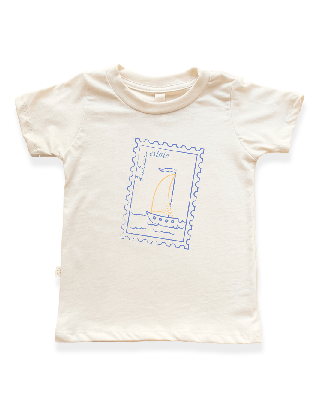 Kids organic cotton T-shirt in light cream with sailboat stamp graphic