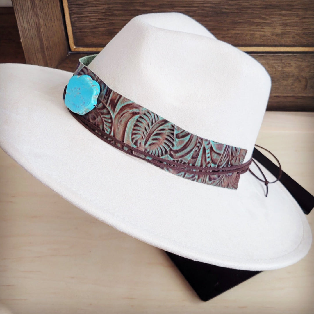 White felt wide-brim hat with brown floral leather band and turquoise button detail