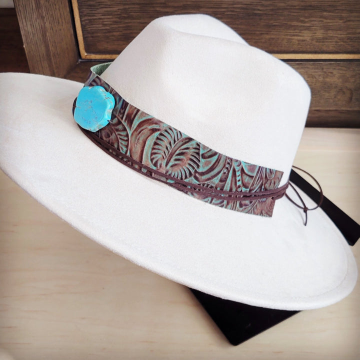 White felt wide-brim hat with brown floral leather band and turquoise button detail