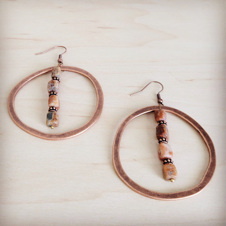Copper hoop earrings with vertical bead-stacked dangles, earth-toned