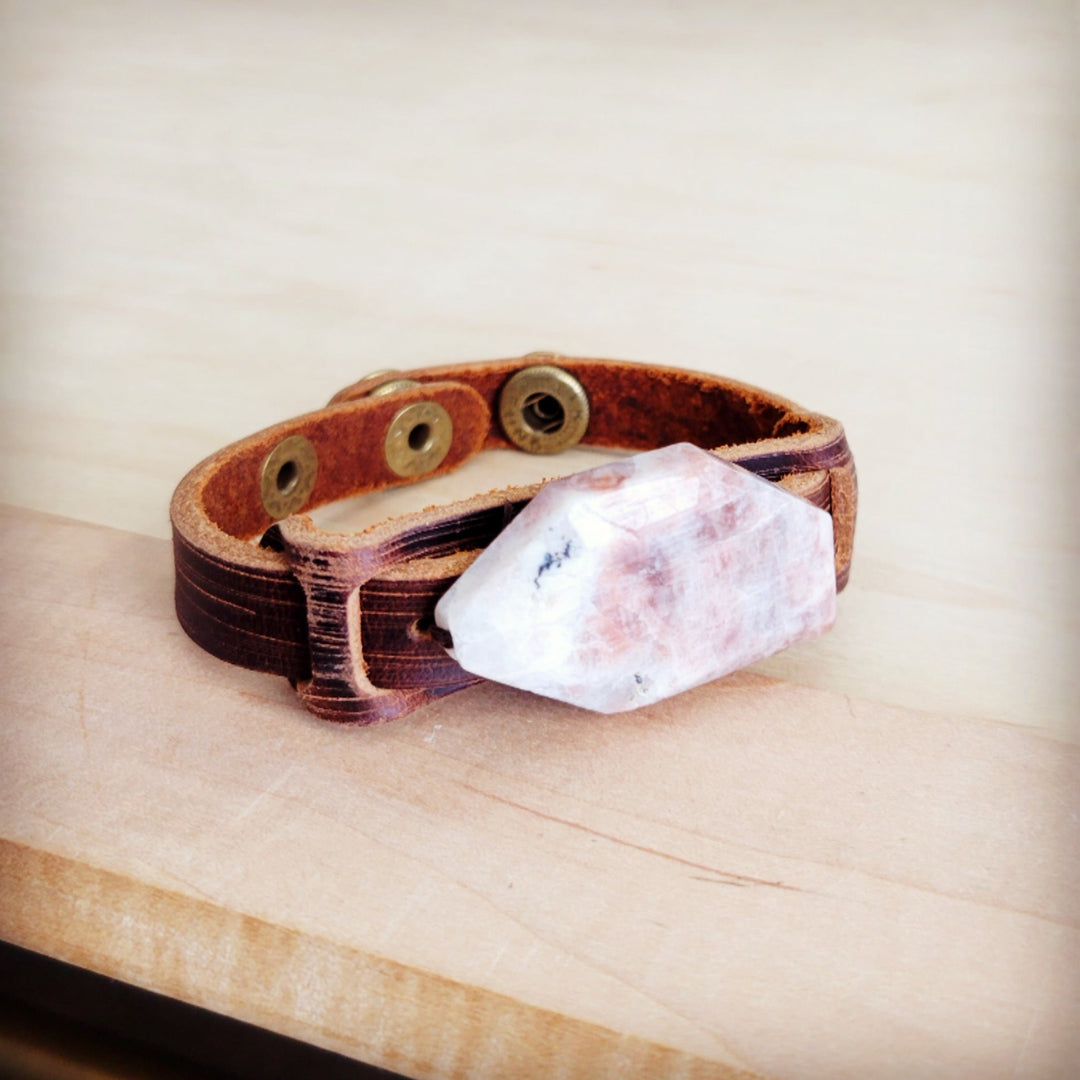 Brown leather cuff bracelet with pink-white crystal and metal studs across top