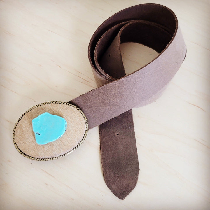 Distressed brown leather belt with turquoise stone buckle accent and metal roller buckle