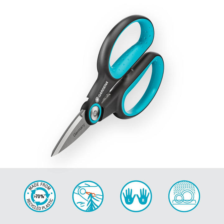 Herb scissors with teal finger loops and black handles, compact design