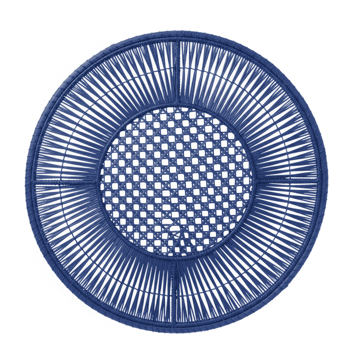 Round handwoven iraca placemat in deep purple with open lattice center and edge ring